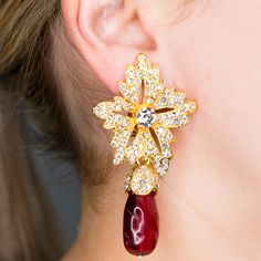 Product Description: In these gold and crystal flower earrings with a ruby teardrop you will look red carpet ready. Pair with a simple necklace or let them speak for themselves. Style Number: ﻿3562ER Teardrop Earrings Gold, Red Carpet Ready, Flower Top, Flower Tops, Gold Crystal, Flower Clip, Crystal Flower, Kenneth Jay Lane, Clip Earrings