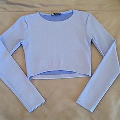 Nwot Zara Long Sleeve Crop Top Blue Crop Top For Fall, Zara Long Sleeve Crop Top For Spring, Blue Ribbed Crop Top With Crew Neck, Blue Ribbed Crew Neck Crop Top, Fitted Blue Crop Top For Winter, Blue Long Sleeve Ribbed Top, Fitted Light Blue Long Sleeve Top, Blue Fitted Long Sleeve Crop Top, Fitted Long Sleeve Blue Crop Top