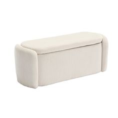 an upholstered white storage box on a white background