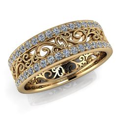 an intricately designed wedding band with diamonds in yellow gold, set on a white background