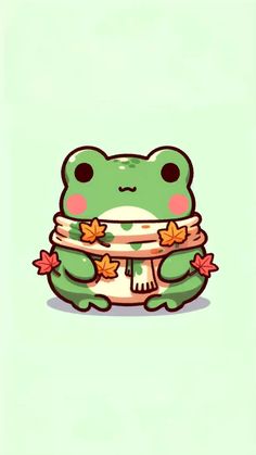 a green frog with leaves around it's neck sitting on top of a stack of pancakes