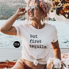 But First Tequila Shirt, Cinco De Mayo Shirt, Tequila Shirt But First Tequila Tshirt, Funny Tequila Tshirt Tequila Dealer Bar Tee 75+ QUOTES This listing is for ( 1 ) Bella Canvas t-shirt of your choice in adult Unisex sizes.  To order MULTIPLES, add to cart one at a time. Available in the following colors: Berry, Pink, White, Heather Gray (light), Dark Gray, Yellow, Red, White, Natural, or Black WHITE lettering printed on: Dark Gray, Heather Gray, Berry, Black, Red, Green BLACK lettering printe Tequila Squad Shirts, Cinco De Mayo Graphic Cotton T-shirt, Cotton Graphic Tee For Cinco De Mayo, Casual White Top For Cinco De Mayo, Cinco De Mayo Graphic Tee With Crew Neck, Cinco De Mayo Funny Print Cotton Tops, Cinco De Mayo Cotton Tops With Funny Print, Cotton Tops With Funny Print For Cinco De Mayo, Cotton Tops With Graphic Print For Cinco De Mayo