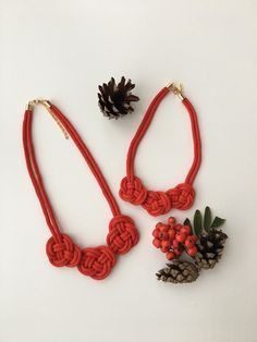 Matching red rope knot necklaces for mother and daughter. Necklaces for every occasion. Made from red soft rope for every women and her daugter. These amazing necklaces are perfect gift for Birthday, Christmas or for Mother's day! These necklaces perfectly fits with casual or festive outfit. These wonderful and elegance necklaces comes with a gold tone chain and lobster clasp.  Length is adjustable. Both necklace can be made by you request (Depending on the age of daughter). If you want some min Adjustable Red Necklace For Holiday, Handmade Red Jewelry For Mother's Day, Handmade Red Necklace For Christmas, Adjustable Red Necklace For Gift, Red Necklace For Christmas Gift, Adjustable Red Necklace With Cord, Red Necklace With Adjustable Cord, Red Christmas Necklaces Perfect For Gifting, Red Christmas Necklace Gift