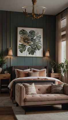 a bedroom with a bed, couch and paintings on the wall above it's headboard