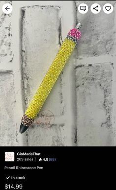 a yellow and pink pen with lots of swarongs on it's side