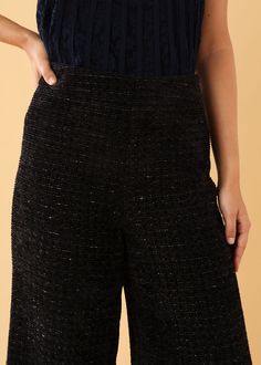 These wide-leg trousers are the perfect piece to polish off your winter wardrobe. Crafted in our black sparkle boucle tweed, these trousers zip up the side to give you a flattering, clean silhouette. Complete the look with the matching Calvin blazer for a full suit or the Mimi shrug for a sassy look . Perfect for a dressed-up occasion, and a great office staple! Classic fit. We recommend ordering your true size. Back faux welt pocket Inseam 31" Fabric: Boucle tweed Dry cleaning or hand washing i Brand Moodboard, Tweed Pants, Black Tweed, Black Sparkle, Jumpsuit Trousers, Wide Leg Trousers, Winter Wardrobe, Summer Wardrobe, Hand Washing