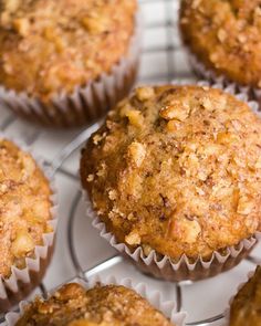 several muffins are cooling on a wire rack