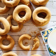 doughnuts and a glass of milk on a table