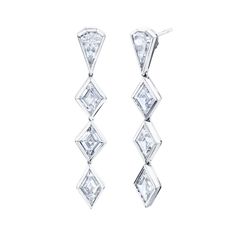 These stunning 3.7 Carat Lozenge Diamond Dangle Earrings are crafted with a classic lozenge diamond cut and set in bezel settings for an elegant look. With a total carat weight of 3.74 and clarity rating of D-E and color rating of VS, these non-certified diamonds are sure to make an eye-catching fashion statement. Available in 18 Carat white, gold, and rose gold. Lozenge Diamond, Lozenge Cut, Cut Earrings, Diamond Dangle Earrings, Diamond Cut, Bezel Setting, Fashion Statement, Diamond Cuts, Jewelry Box