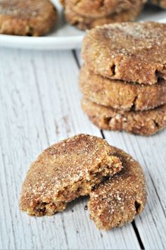 several cookies are stacked on top of each other with one bite taken out of it