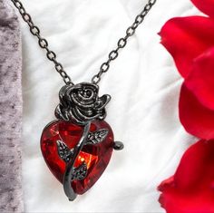 Gothic Black Rose Heart Shaped Ruby Red Gemstone Pendant Baddie Necklace Jewelry Gorgeous Synthetic Ruby Heart Wrapped With A Black Rose. Very Sparkly. Elegant And Feminine. This Is A Boutique Item. Brand New. Never Worn. New In Package. Nwt Nip Bnwt Perfect Condit Theme: Goth, Edgy, Punk, Emocore, Hip Hop, Western, Cowgirl, Country Music Festival, Boho Type: Necklace, Costume, Fashion Jewelry, Pendant, Ornament, Accessory Includes: Pendant + Dainty Black Link Chain Color: Charcoal Black, Red Si Baddie Necklace, Ruby Heart Necklace, Goth Necklace, Country Music Festival, Ruby Heart, Goth Wedding, Rose Heart, Costume Fashion, Black Goth