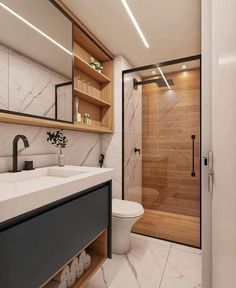 a bathroom with a toilet, sink, and shower in it's own space