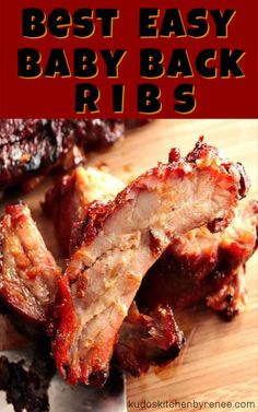 baby back ribs on a cutting board with the words, best easy baby back ribs