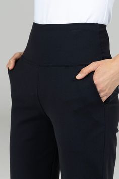 Why we love this: Meet our new Straight Leg Ankle Pant from our Fall Collection! Elegantly fitted for maximum comfort and ultimate polish, these black dress pants will meet all your day-to-day needs. Features: KiraGrace PowerStrong: Feels like cotton & keeps you dry Ultra High-Rise 26" inseam Slimming waist band w/side pockets Made in U.S.A. of imported fabric Waist: High-Waisted (12.5" Rise) Inseam: 26" inseam Leg Shape: Straight leg crop Sizing: True to size Compression: Medium compression Mod Black Wide Leg 4-way Stretch Leggings, Black Wide Leg Leggings With 4-way Stretch, Sleek Stretch Black Dress Pants, Sleek Black Stretch Dress Pants, Black Athleisure Pants With Side Pockets, Black Pants With Side Pockets In Elastane, Black Elastane Pants With Side Pockets, Versatile Fitted Yoga Pants For Work, Black Full Length 4-way Stretch Pants