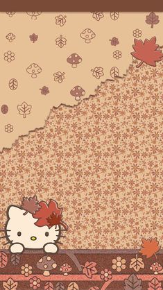 an image of a hello kitty wallpaper with autumn leaves and fall colors on it