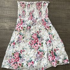 Forever 21 Floral Strapless Dress Two Front Pockets Size : Medium White With Pink & Purple Floral Design Never Used / No Tags Lining Shown In Photo White Bandeau Mini Dress For Spring, White Floral Print Strapless Sundress, Spring Vacation Mini Tube Top, White Floral Print Strapless Dress For Beach, White Floral Print Strapless Dress For The Beach, White Bandeau Mini Dress For Vacation, White Strapless Floral Dress For Beach, Forever 21 Floral Print Beach Mini Dress, White Floral Print Tube Top For Spring