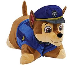 a stuffed animal that is wearing a blue vest and hat on it's back