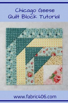 the chicago geese quilt block is shown in blue and white with pink flowers on it