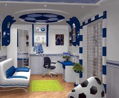 a soccer themed room with blue and white decor, including a couch, chair, desk, computer monitor and soccer ball on the floor