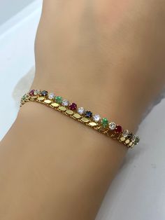 Colorful Bracelet, Gemstone Bracelet, Gold Bracelet, 18k Chain Bracelet, Gold Vintage Jewelry, Jewelry Gift, Emerald, Sapphire, Ruby, Zircon *100% natural gemstone *18k solid gold *solid gold (NOT plated) *gemstone : ruby-sapphire-emerald-zircon *gemstone: 3.00 mm. *stone shape: round *stones emerald: 8 pcs. *stones ruby: 9 pcs. *stones sapphire : 8 pcs. *stone zircon : 25 pcs. *total gemstones : 50 pcs. Gold Multi-stone Tennis Bracelet, Gold Diamond Multi-stone Bracelets, Gold Diamond Bracelets With Multi-stones, Elegant Jeweled Yellow Gold Bracelet, Yellow Gold Multi-stone Tennis Bracelet, Gold Cubic Zirconia Multi-stone Bracelets, Yellow Gold Jubilee Crystal Bracelet, Yellow Gold Multi-stone Tennis Bracelet As Gift, Gold Vintage Jewelry