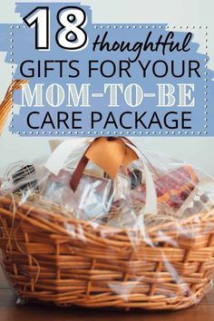 a basket filled with gifts for mom - to - be care packages on top of a wooden table