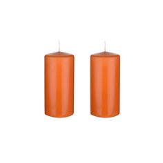 two orange candles sitting next to each other