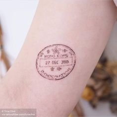 a woman's arm with a stamp on it that reads hong kong, 27 oct 2009