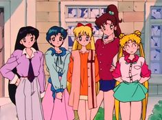 an animated group of young women standing next to each other in front of a building