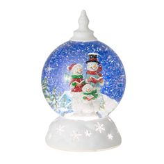 a snow globe with two snowmen in it