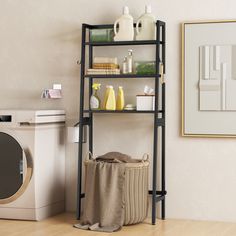 a laundry room with a washer, dryer and shelves filled with cleaning supplies