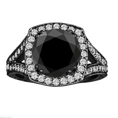 a black and white diamond ring