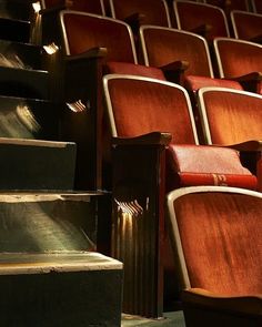 rows of empty seats in an auditorium