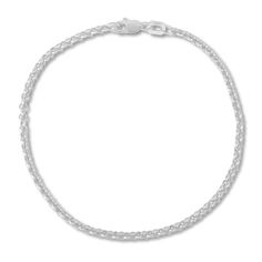 This stylish women's bracelet features dynamic rolo links fashioned of 14K white gold. The bracelet is 7 inches long and is secured with a lobster clasp and the links are approximately 2.5mm wide. White Gold Link Charm Bracelet With Jubilee Design, Classic Link Charm Bracelet With Lobster Clasp, Classic Charm Bracelet With Lobster Clasp, White Gold Jubilee Link Charm Bracelet, Classic Link Chain Bracelet With Rolo Chain, Classic Chain Bracelet With Rolo Chain, Classic Rolo Chain Link Bracelets, Classic Rolo Chain Bracelet, Modern Sterling Silver Rolo Link Bracelet