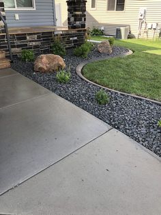 the front yard is clean and ready to be used as a landscaping area for this home