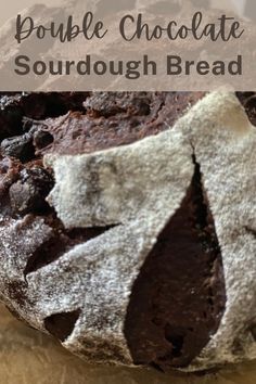 chocolate sourdough bread on a cutting board with the words double chocolate sourdough bread