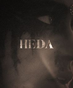 a woman's face with the word heda written on it