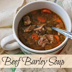 a white bowl filled with beef barley soup