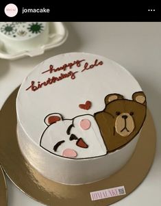 there is a cake with two bears on it