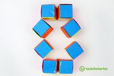 four blue and orange cubes arranged in the shape of a star