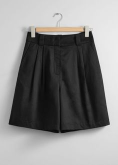 Tailored shorts featuring a high waist and duo slash pockets.• Belt loops• Zip fly with hook and bar closure• Duo welt pockets at the back• Length of inseam:20cm / 7.9" (EU 36 / UK 8 / US 4) Black Tailored Shorts, Summer Style Guide, Suit Jumpsuit, Animal Print Outfits, Tailored Shorts, Swimsuit Fashion, Short En Jean, Short Jumpsuit, Fashion Story