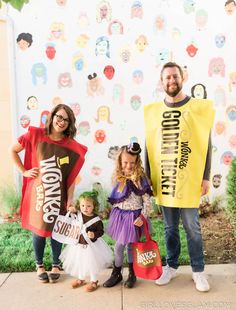 three adults and two children dressed up in costumes