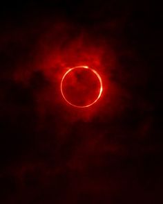 the sun is seen through clouds during a solar eclipse in this photo taken by nasa