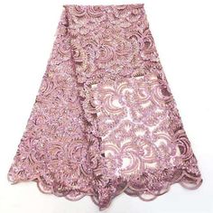 NATALIA Mauve Dusty Pink Gold Floral Embroidery Sequin Tulle Mesh Lace / Fabric by the YardCOLOR: Mauve Pink100% PolyesterWidth - 51/52"Stretch: Moderate StretchUse - Apparel, Costumes, Appliqué, Wedding, Party gowns, Formal Wear, Dresses, Crafts Use***ACTUAL PRODUCT COLORS MAY DIFFER FROM IMAGE ON YOUR COMPUTER DUE TO DIFFERENT MONITOR SETTINGS***ORDER PROCESS:• Sold by the yard.• No exchanges or returns.PACKING YOUR ORDER:•CUT ORDERWe cut and fold your fabric into a small package, much like you would a blanket. If you prefer having fabric on a roll, let us know and we'll ship with an additional shipping fee.•BOLT ORDERWe ship bolt orders on a roll for standard shipping.- LessAll sales are final. Nigerian Lace, Sequin Wedding, Womens Wedding Dresses, African Lace, African Wedding, Sequins Embroidery, Embroidery Fabric, Lace Weddings, Tulle Fabric