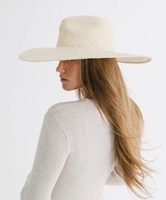 Indulge in effortless sophistication with this fedora style featuring a wide relaxed brim. The intricately hand-woven Panama straw exudes a luxe look + feel that is sure to keep you stylishly shaded from the summer heat while staying light + breezy. Size: 57 (S/M) Elegant Short Brim Boater Hat With Upf 50+, Elegant Boater Hat With Upf 50+ And Short Brim, Flat Brim Panama Hat For Everyday Spring Wear, Everyday Flat Brim Panama Hat For Spring, Chic Straw Panama Hat With Curved Brim, Everyday Panama Hat With Flat Brim For Spring, Elegant Straw Boater Hat With Upf 50+, Modern Everyday Hats For Spring, Spring Everyday Panama Hat With Flat Brim