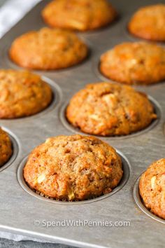 freshly baked carrot muffins in a baking tray ready to be eaten into the oven