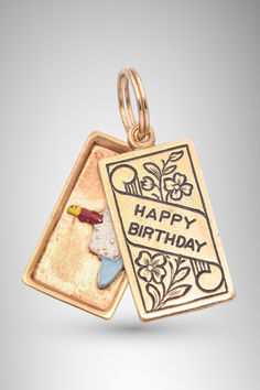 Looking for a special birthday keepsake? This Vintage 14K Yellow Gold Enamel Happy Birthday Postcard Charm is a rare and thoughtful gift. Its intricate design and timeless charm make it perfect for collectors and loved ones alike. #vintagejewelry #birthdaygifts #goldcharm