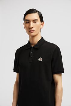 A timeless design that transcends seasons, this polo shirt is crafted from cotton pique. The classic style is embellished with a Moncler logo patch on the chest. Cotton Polo Shirt With Logo Patch, Designer Polo Shirt With Embroidered Logo, Designer Cotton Polo Shirt, Designer Cotton Polo Shirt With Embroidered Logo, Luxury Polo Collar Top With Embroidered Logo, Luxury Cotton Polo Shirt, Moncler Logo, Polo Shirt White, Polo Sweater