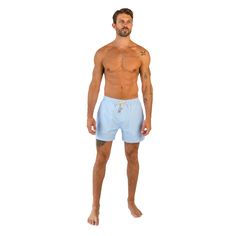 Make a splash this summer with East x East Sea Breeze baby blue men's swim shorts. The serene color and sleek design are perfect for a day at the beach or lounging poolside. Crafted from premium sustainable materials, these shorts are not only stylish but eco-friendly too. The quick-drying fabric and elasticated waistband ensure a comfortable and secure fit, whether you're swimming or playing beach volleyball. With their timeless style and sustainable materials, our Sea Breeze shorts are a must-