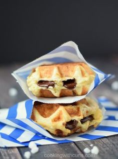 two waffles sitting on top of each other with chocolate in the middle and text overlay reading chocolate kege waffles