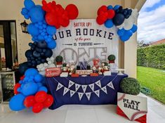 a baseball themed party with balloons and decorations